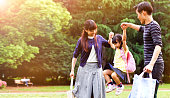 Family having a walk outdoors in summer, Tokyo创意图片素材 - E+