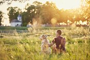 Man with his dog at sunset创意图片素材 - 500px Prime RF
