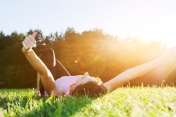 Young beautiful woman lying, relaxing and stretching on the gras创意图片素材 - 500px Core RF