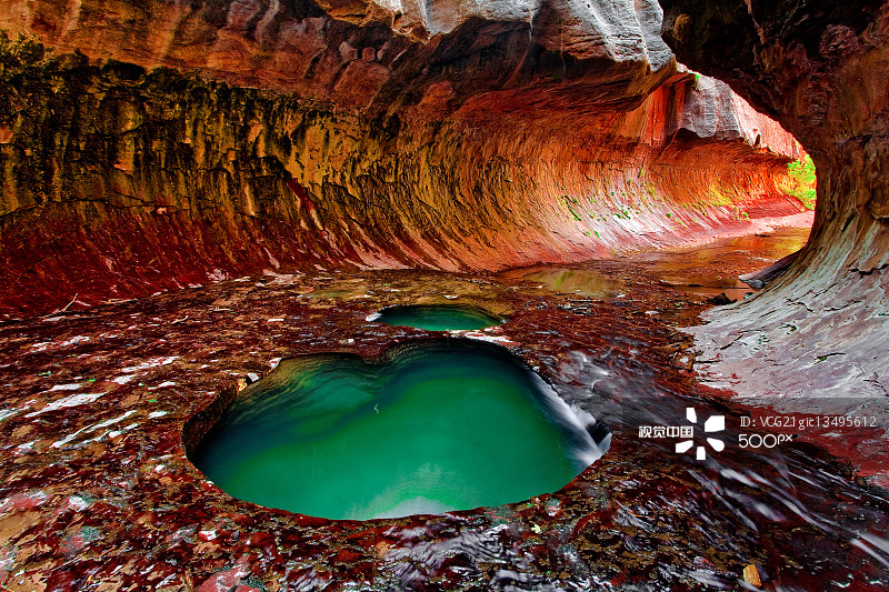 Green water hole inside gorge, Zion National Park, Utah, USA