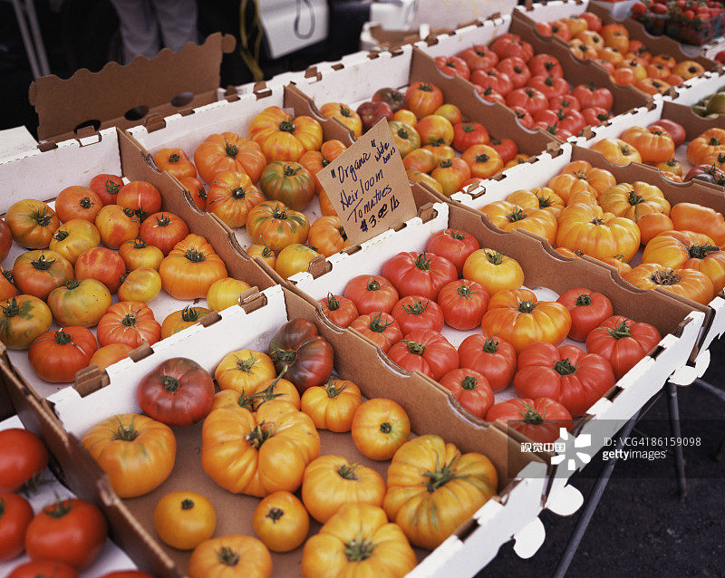 Organic heirloom tomatoes at market