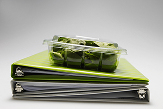 Plastic Box with Salad on Files corbis圖片素材