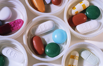 Assorted Medicine Pills in Caps corbis圖片素材