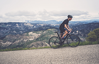 Senior Cyclist on hills above Santa Barbara corbis图片素材