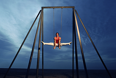 Gymnast Performing Routine On Stationary Rings corbis图片素材